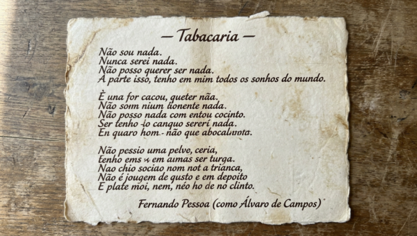 Excerpt of the poem 'Tabacaria' by Fernando Pessoa on an aged piece of paper